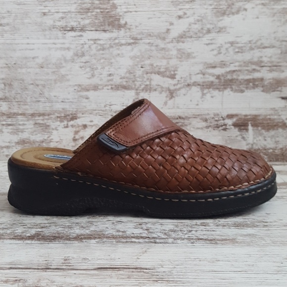 brown woven leather mules
